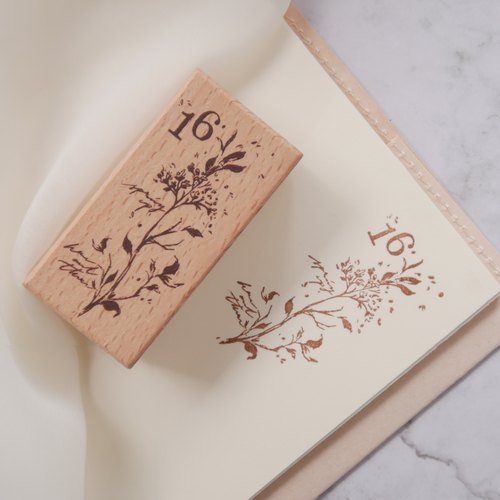 ST-007 Beech wood stamp with floral design and printed impression on paper.