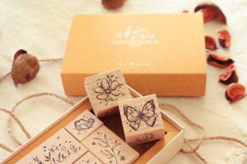 Botanic Collection flower stamp set with floral and butterfly designs.
