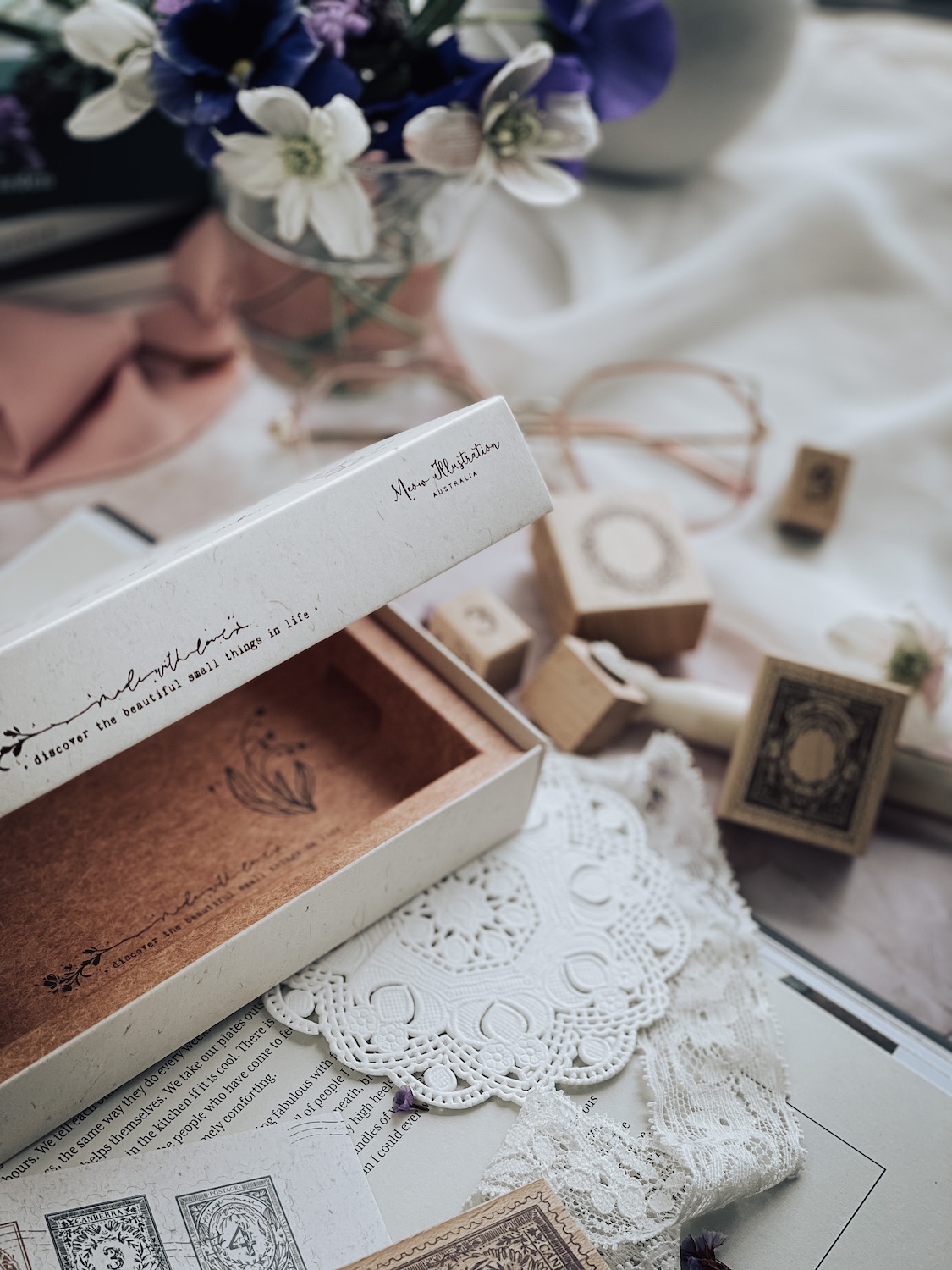 14-piece floral numbers stamp set with intricate designs and packaging.