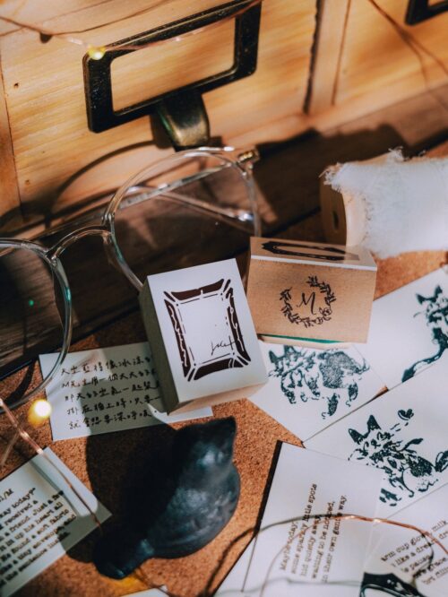 Collector Mr.M Signed Frame Stamp with wooden handle and artistic design.