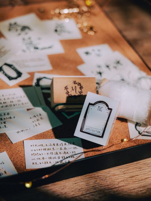 Collector Mr.M stamp with elegant design and wooden handle.