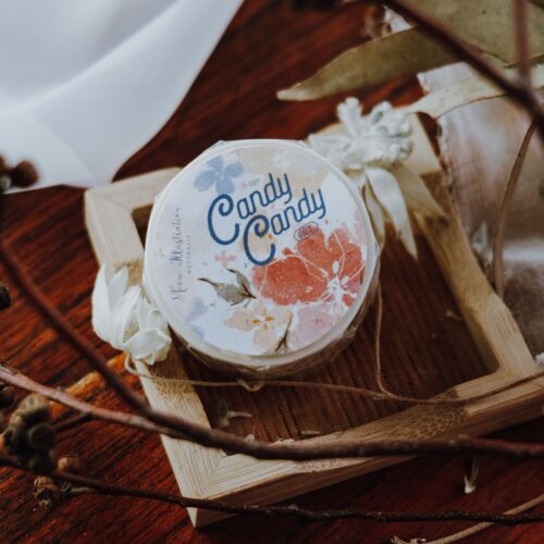 Candy Candy Matte PET tape with floral design on wooden surface.