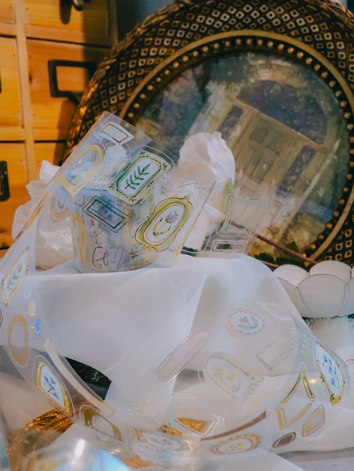 Frames Glossy Kiss-Cut PET Tape with Matte Gold Foil on display.