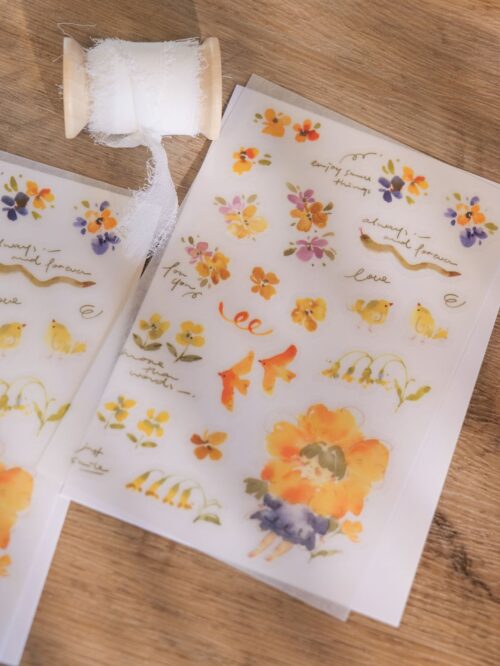 Lemon Nini flower girl transfer stickers with floral and snake motifs.