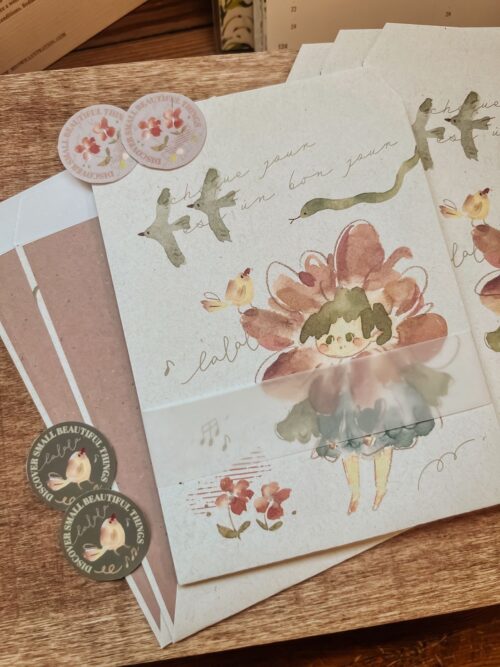 Peach envelope set with Flower Girls design and decorative stickers.