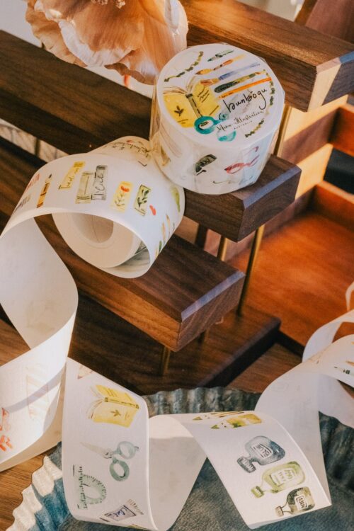 Bunbogu Kisscut Washi-Tape with colorful designs on wooden shelf.