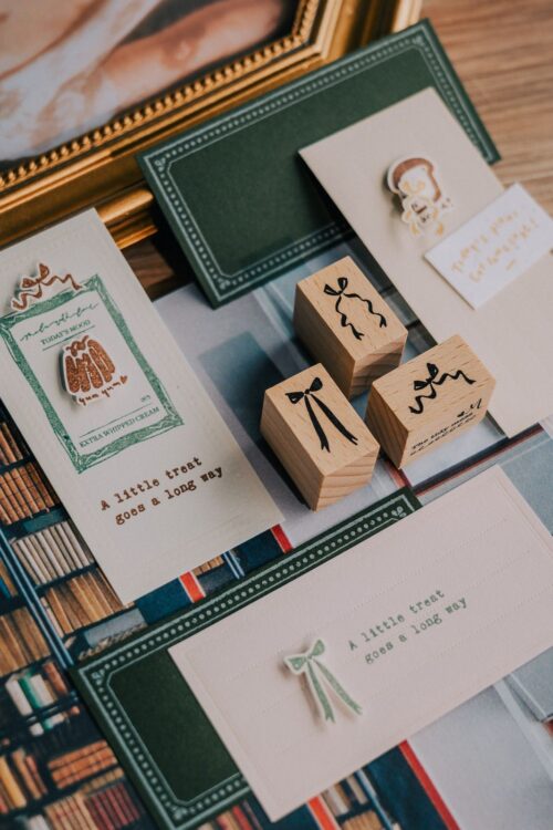 The Tidy Mess Stamp Set with beech wood handles and cream rubber.