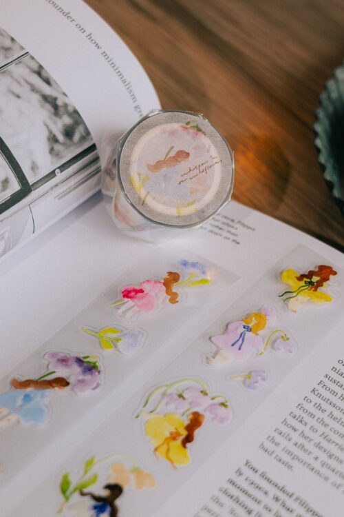 Whispers in the Flower Field Glossy PET tape with kiss-cut floral designs.