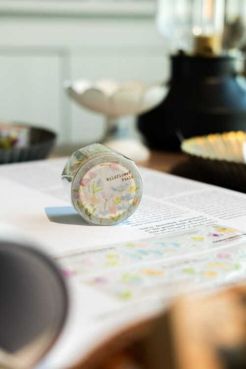 Wildflower Field Glossy PET Tape with kiss-cut design on a table.