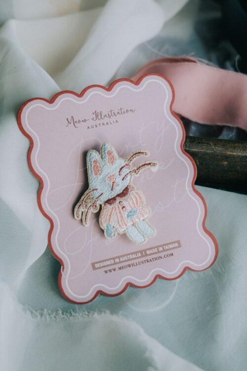 Pink Magician Cat embroidered pin with silver backing, 4.6 x 5 cm.
