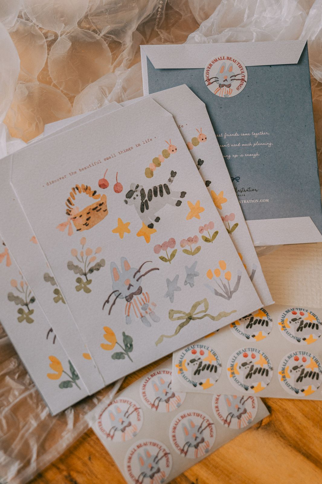 Party in the Forest envelope and sticker set with cute animal designs.