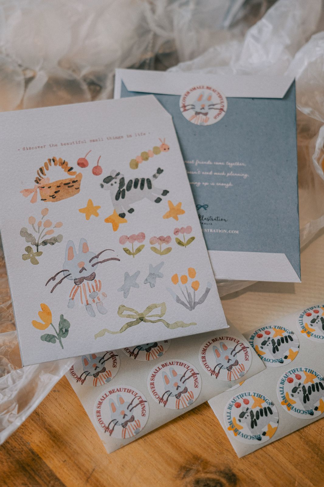 Forest-themed envelope and sticker set with whimsical designs.